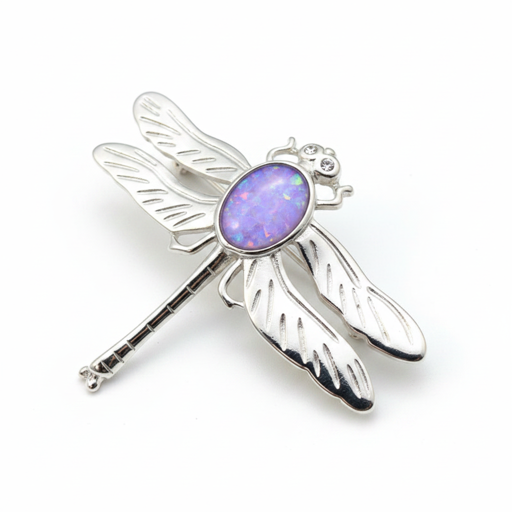 Silver 925 dragonfly brooch with lavender purple opal resin in 10x8mm central setting on white background