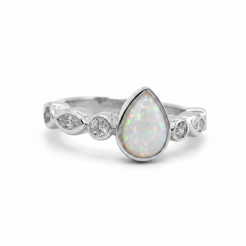 Pear marquise shank CZ 925 silver ring with white pearl opal resin in pear centre setting on white background