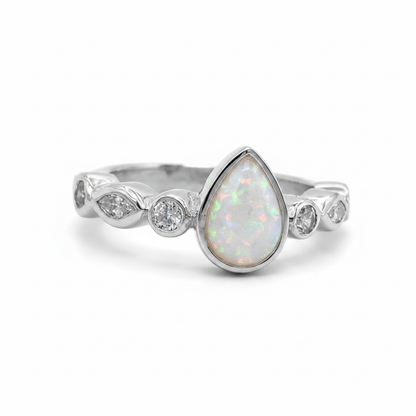 Pear marquise shank CZ 925 silver ring with white pearl opal resin in pear centre setting on white background