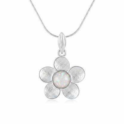 Silver 925 daisy flower memorial pendant with white opal and mica, white background