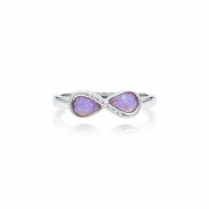 925 sterling silver CZ infinity memorial ring with lavender purple opal resin in pear bezels on white background