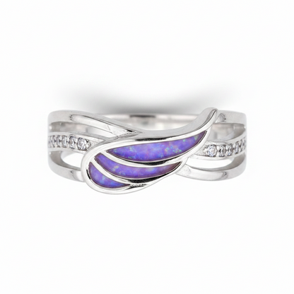 Angel wing CZ 925 silver ring with lavender purple opal resin in wing-shaped settings on white background