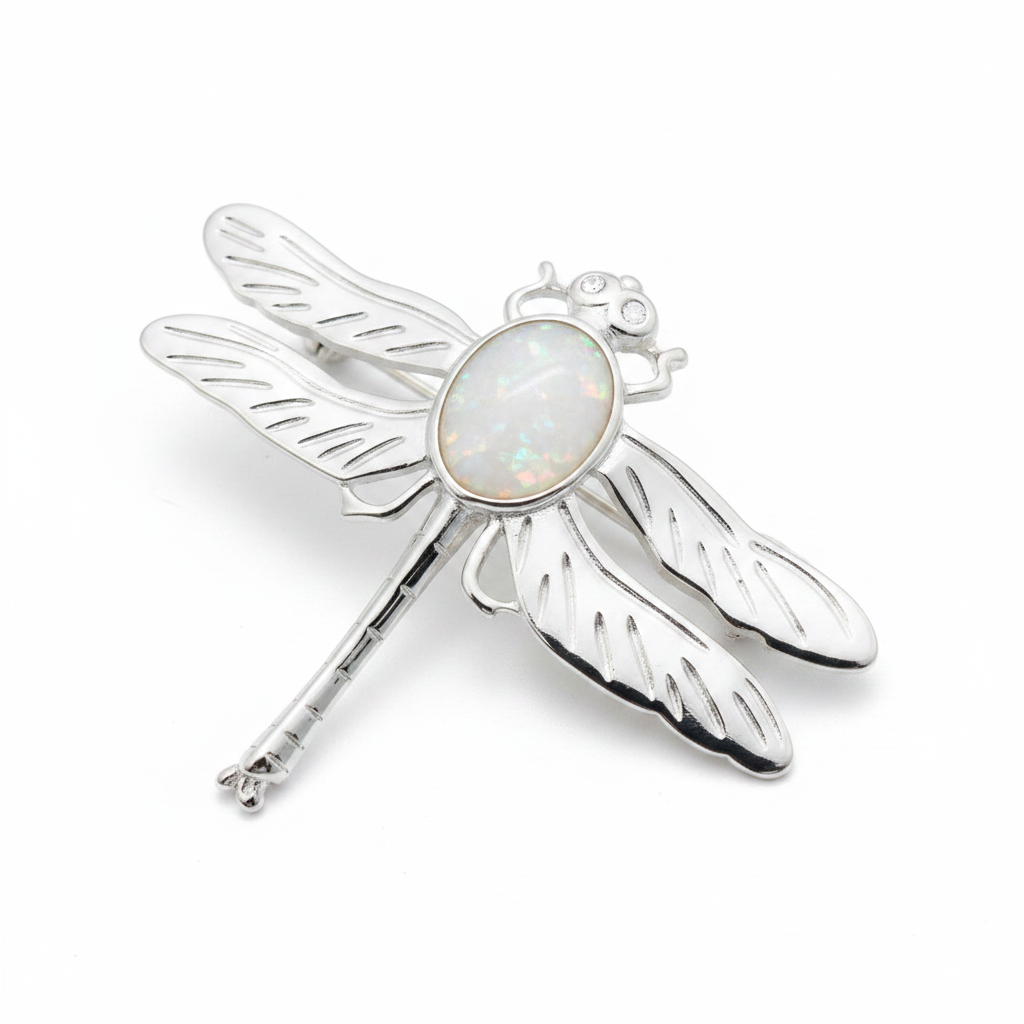 Silver 925 dragonfly brooch with white pearl opal resin in 10x8mm central setting on white background