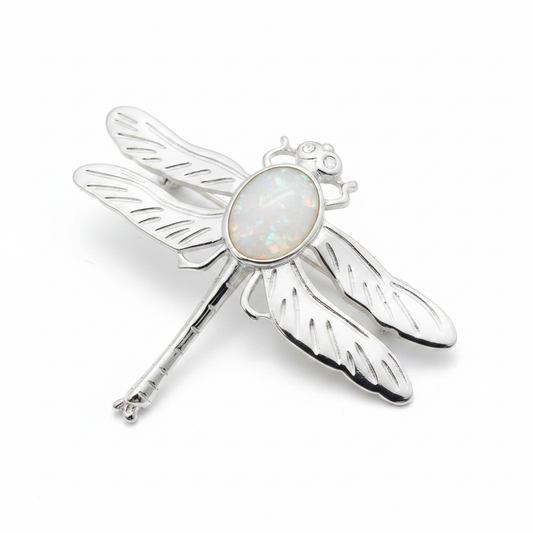 Silver 925 dragonfly brooch with white pearl opal resin in 10x8mm central setting on white background