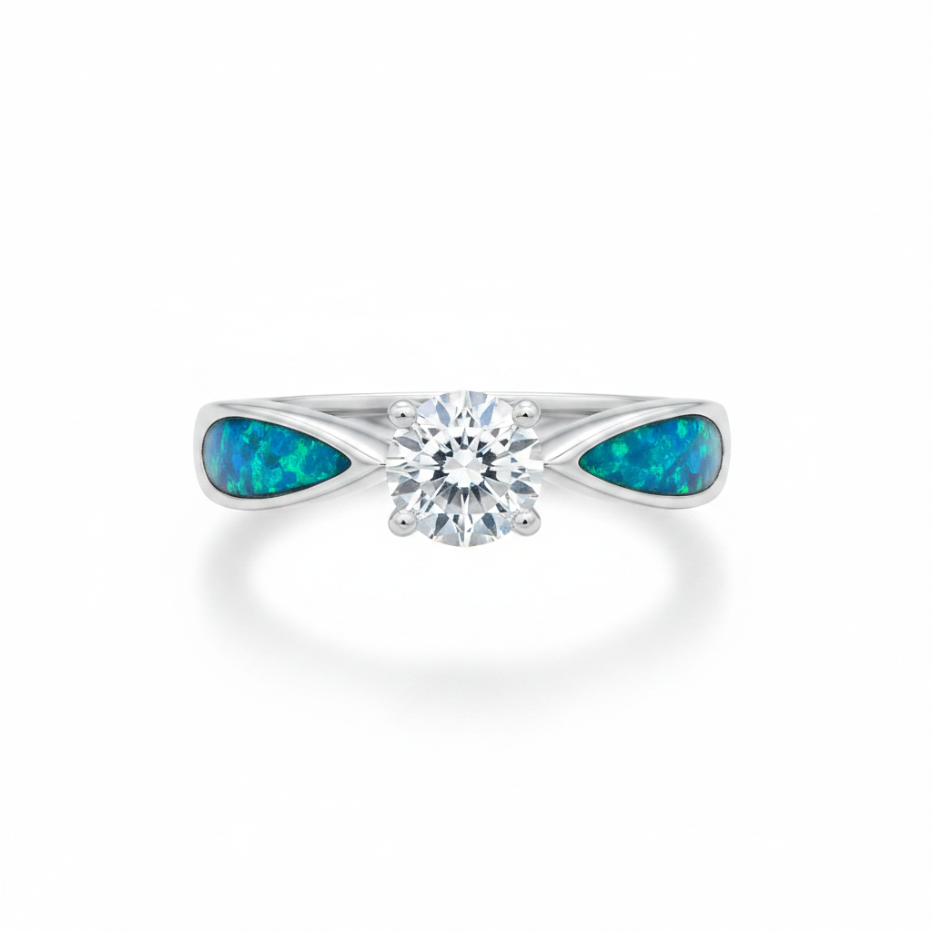 Solitaire CZ 925 silver ring with blue teal opal resin in teardrop shoulder settings on white background