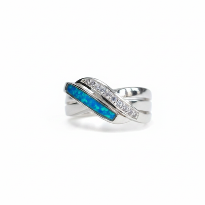 925 sterling silver double crossover band memorial ring with blue teal opal flakes resin on white background