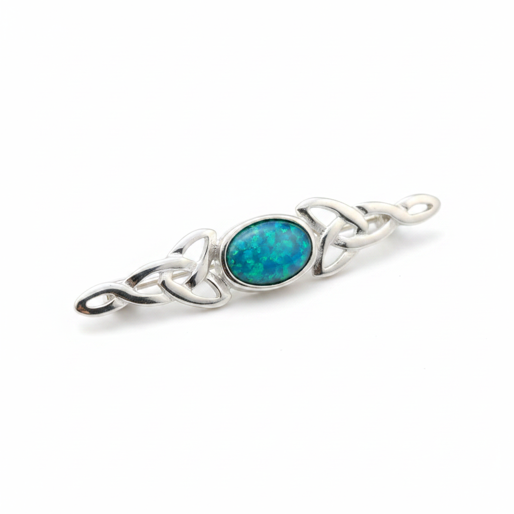 Silver 925 dainty Celtic trinity knot lapel brooch with blue teal opal resin in 7x5mm central setting on white background