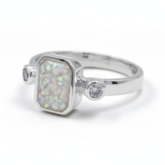 Double gem emerald 925 silver ring with white pearl opal resin in 9x7mm rectangular setting on white background