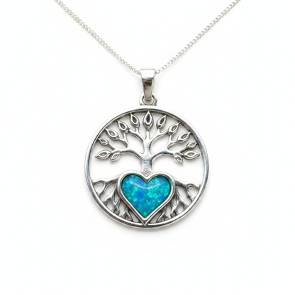 925 sterling silver tree of life memorial pendant necklace with blue teal opal resin in heart bezel on white background