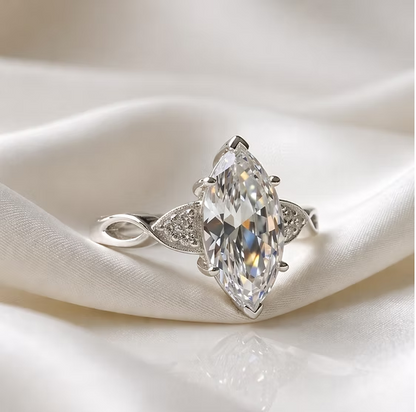Statement marquise CZ 925 silver ring on white silk — blank silver