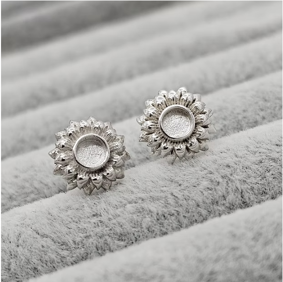 Silver 925 sunflower stud earrings on grey velvet — blank silver