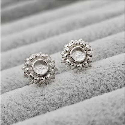 Silver 925 sunflower stud earrings on grey velvet — blank silver