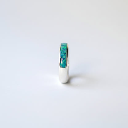 Customisable opal colours for the ladies silver channel ring with ashes, offering a personal touch for each customer