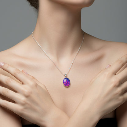 Back View of Memorial Opal Flake Oval Pendant on Sterling Silver Chain – A back view of the oval pendant, showcasing its smooth sterling silver setting and opal flakes inside.
