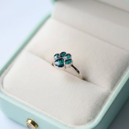 Close-up of an 8mm paw print memorial ring, available in sterling silver or 9K gold, beautifully crafted to honour your beloved pet.