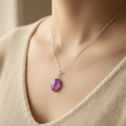 Hand Wearing Sterling Silver Necklace with 10x14mm Memorial Pendant – A model’s hand displaying the elegant sterling silver necklace with a personalised 10x14mm stone.